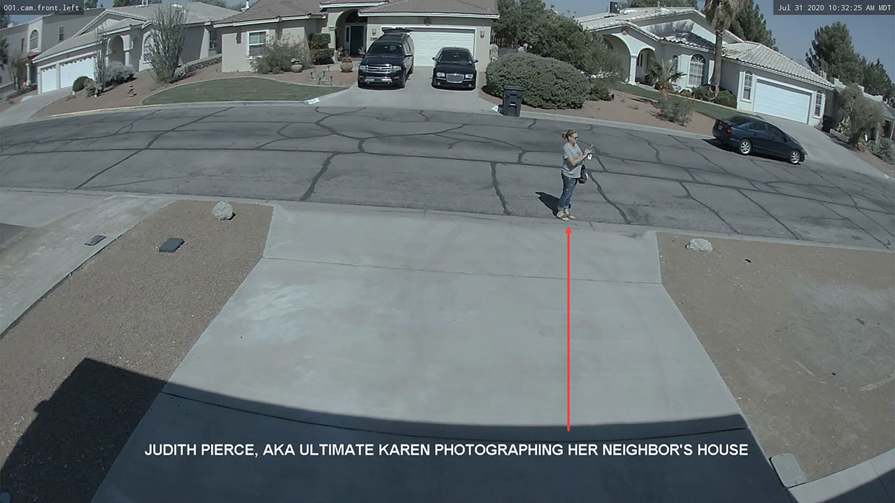 Judith Pierce, AKA the Ultimate Karen, photographing her neighbor's house, July 31, 2020.