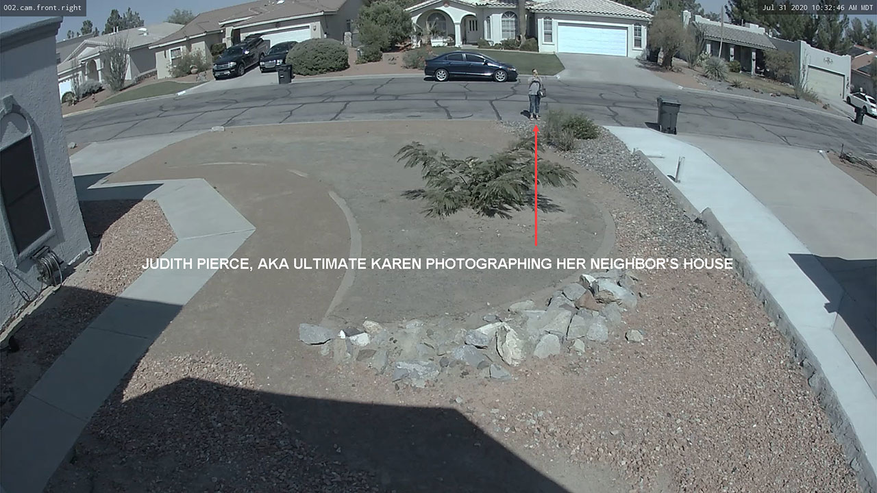 Judith Pierce, AKA the Ultimate Karen, photographing her neighbor's house, July 31, 2020.