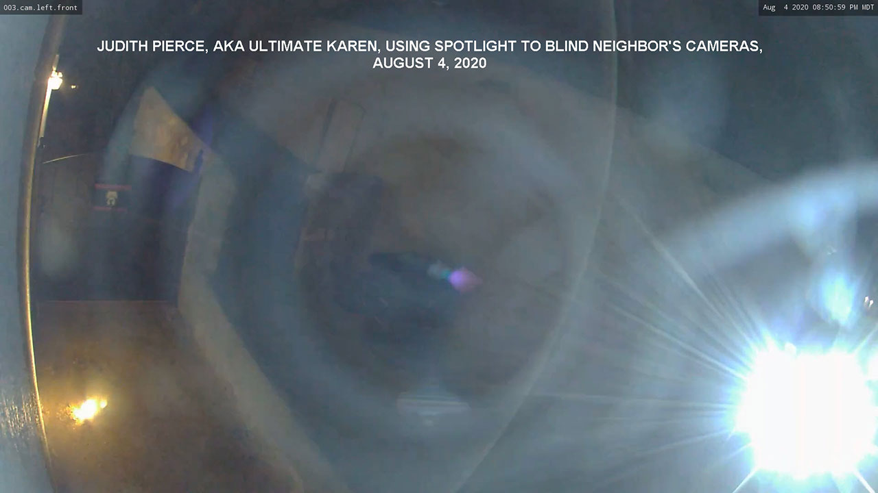 Judith Pierce using spotlight to blind her neighbor's cameras, August 4, 2020.